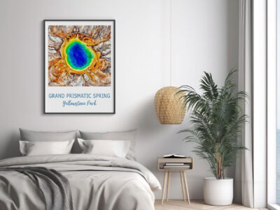Bedroom with Grand Prismatic Spring artwork on wall