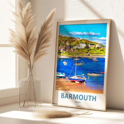 Barmouth framed art beside pampas grass vase.