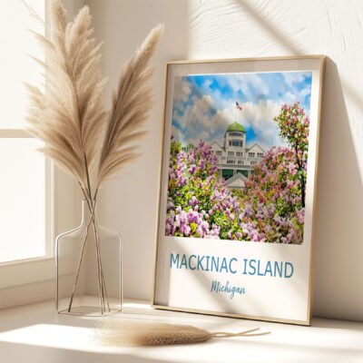 Framed Mackinac Island poster with flowers, sunny room.