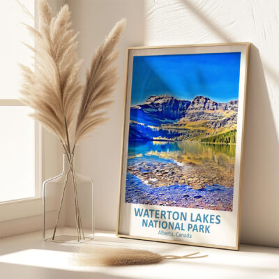 Waterton Lakes poster and pampas in vase on shelf.