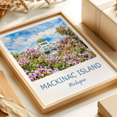 Framed Mackinac Island print with flowers and gift box.