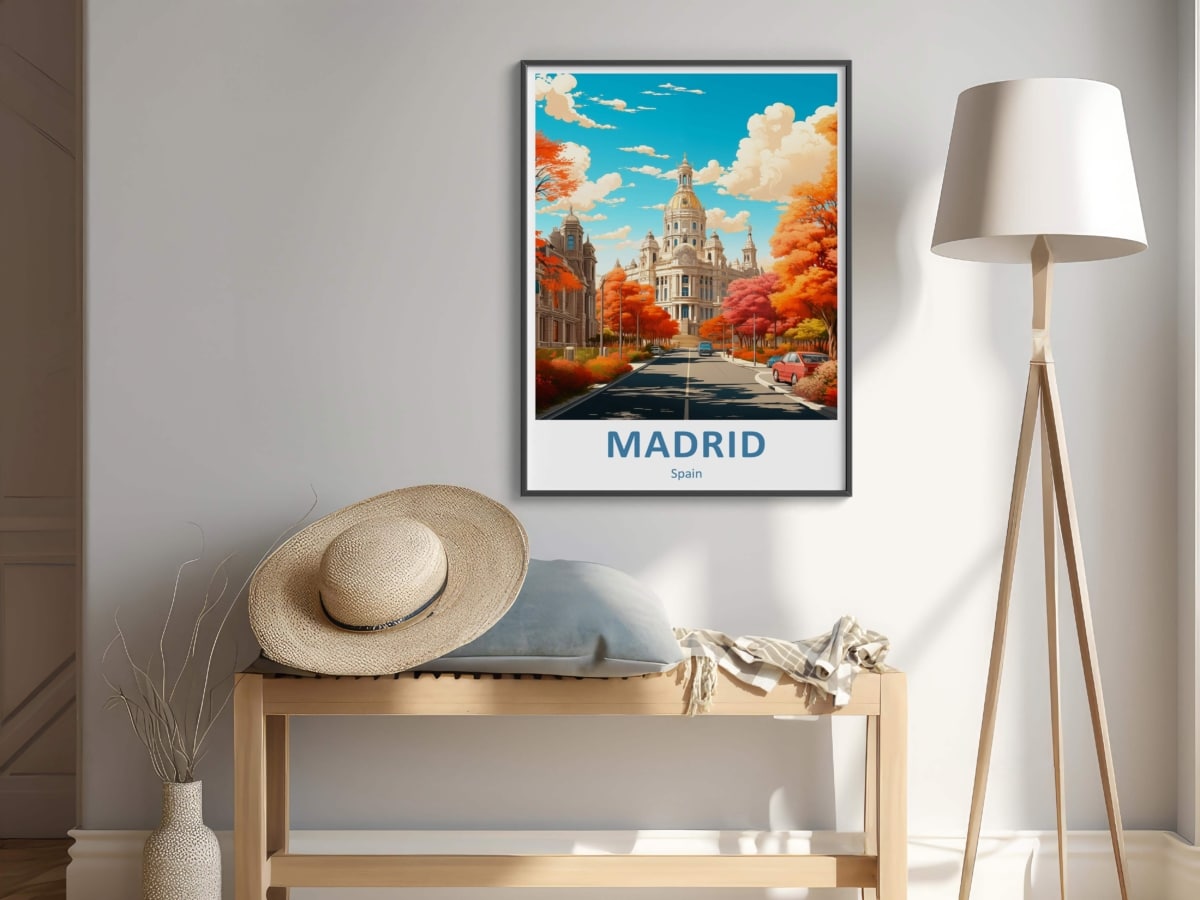 Stylish home decor featuring Madrid poster and straw hat.
