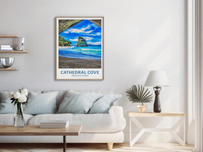 Modern living room with Cathedral Cove artwork.