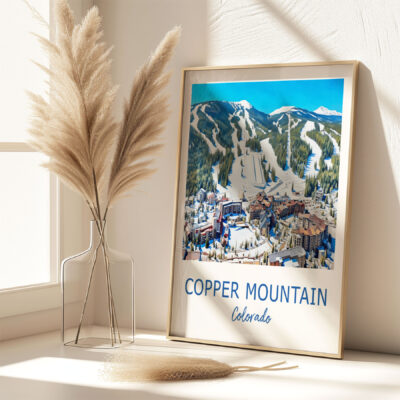 Framed Copper Mountain Colorado ski poster on table.