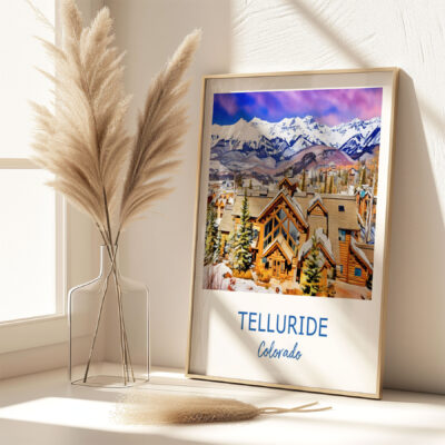 Telluride Colorado framed art with snow-covered town scene.