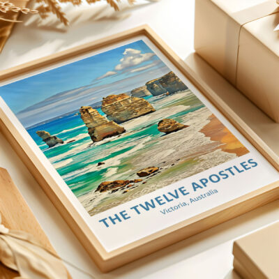 Framed photo of Twelve Apostles, Australia on table.