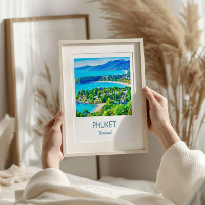 Person holding framed Phuket, Thailand photo print.