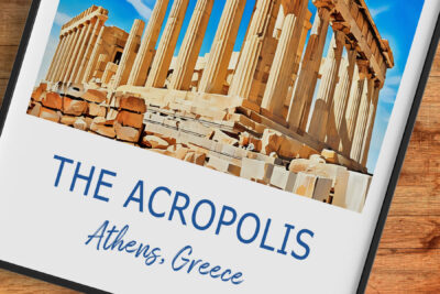 Acropolis ruins in Athens, Greece under blue sky.