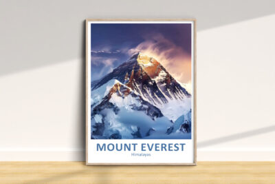 Framed Mount Everest poster on wooden floor.