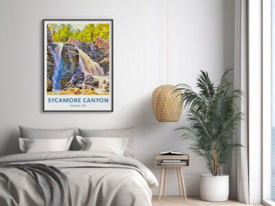Bedroom with Sycamore Canyon poster and plant.