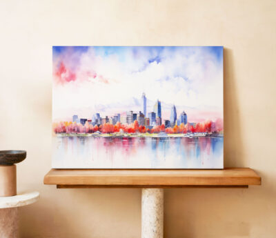 Colorful watercolor cityscape painting on display.