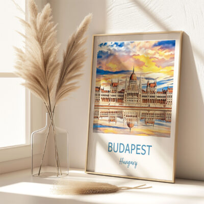 Framed Budapest Parliament artwork beside pampas grass vase.