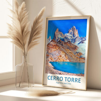 Cerro Torre mountain poster on desk with pampas grass.
