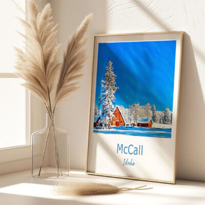 Framed winter scene of McCall, Idaho on table.