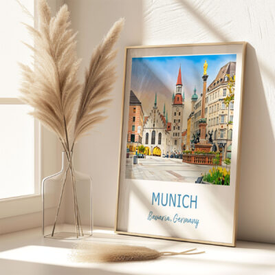 Framed Munich city painting on sunny windowsill.