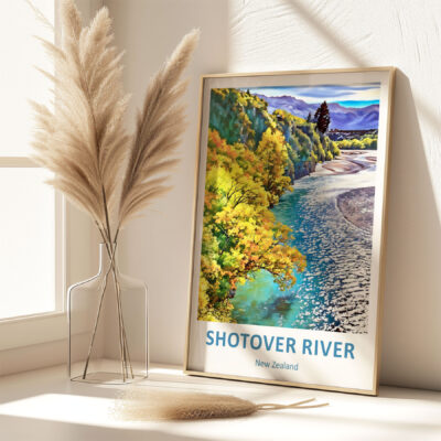 Framed Shotover River art print, displayed beside vase.