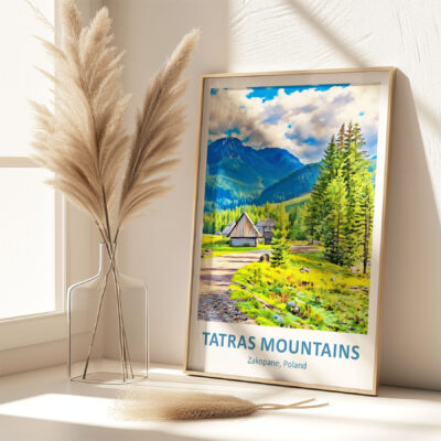 Framed Tatras Mountains poster on sunny windowsill.
