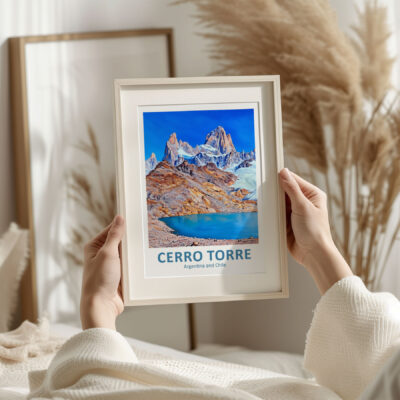 Framed Cerro Torre poster with mountains and lake.