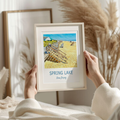 Person holding Spring Lake, New Jersey beach photo.