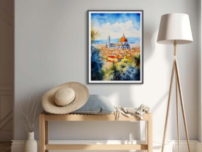 Framed Florence poster above bench with hat, lamp nearby.