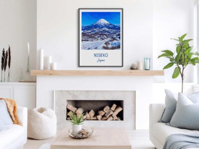 Living room with Niseko Japan poster above fireplace.