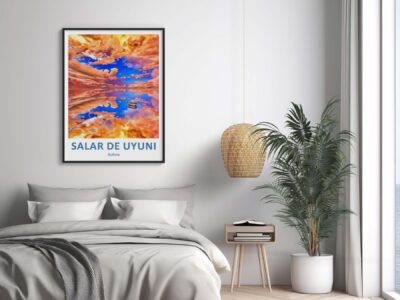 Framed Salar de Uyuni art above modern bed.