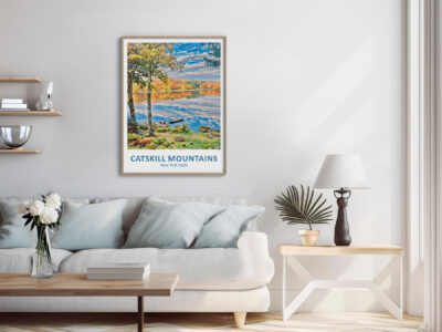 Living room with Catskill Mountains poster on wall.