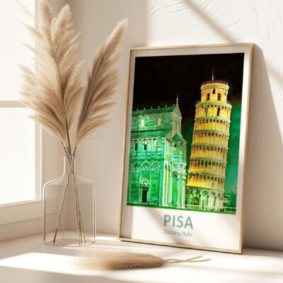 Framed Pisa poster beside pampas grass vase.