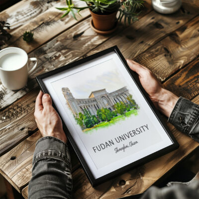 Framed Fudan University art on rustic table.