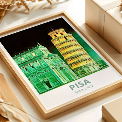 Framed Pisa Tower art print on table.