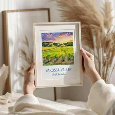 Framed Barossa Valley vineyard artwork held by hands.