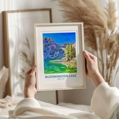 Framed Bloomington Lake artwork held indoors.