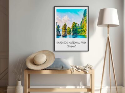 Framed Khao Sok National Park poster in cozy room.