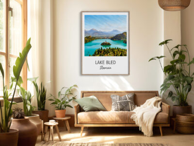 Living room with Lake Bled poster and plants.
