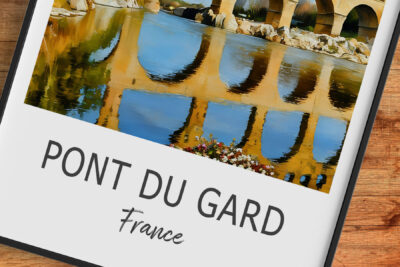 Pont du Gard reflection in water, France.