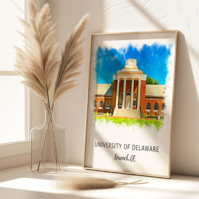 University of Delaware framed watercolor displayed on shelf.