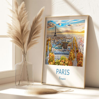 Paris skyline framed artwork on sunny windowsill.