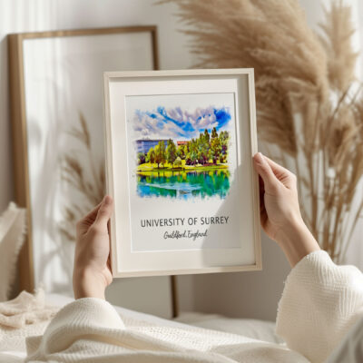 Framed University of Surrey artwork with serene landscape.