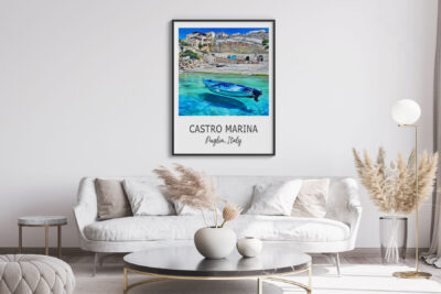 Modern living room with beach poster on wall.