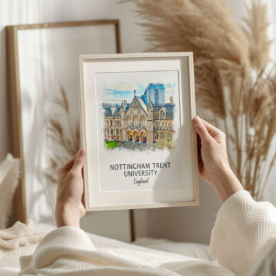 Framed Nottingham Trent University artwork held in hands.