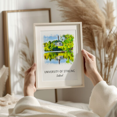 Framed University of Stirling print, person holding.