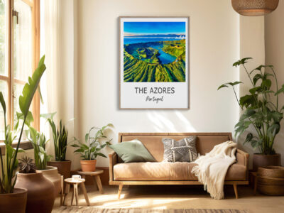 Cozy living room with Azores Portugal poster on wall.