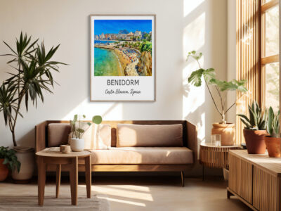 Living room with Benidorm beach poster on wall.