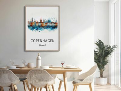 Dining room with Copenhagen artwork on wall.