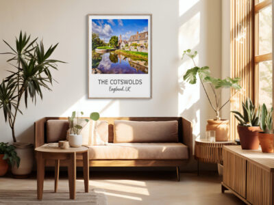 Cozy living room with Cotswolds poster.