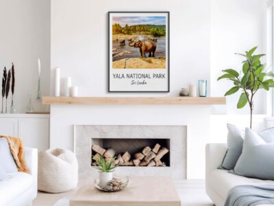 Modern living room with nature artwork above fireplace.