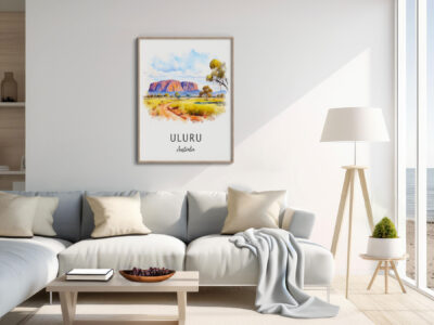 Modern living room with Uluru painting on wall.