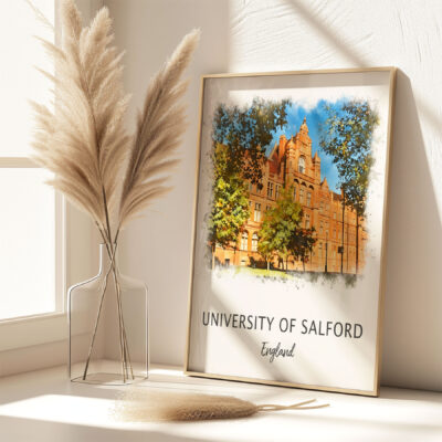 University of Salford framed art on table.