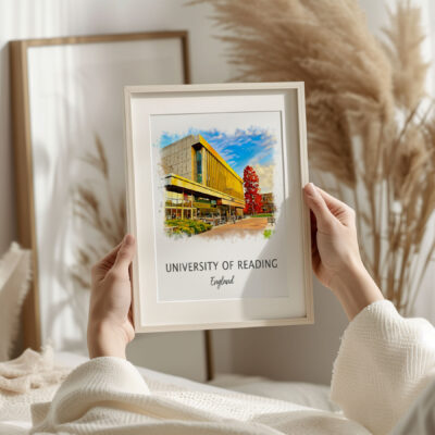 Framed University of Reading print held by person.