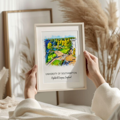 Hands holding framed University of Southampton artwork.